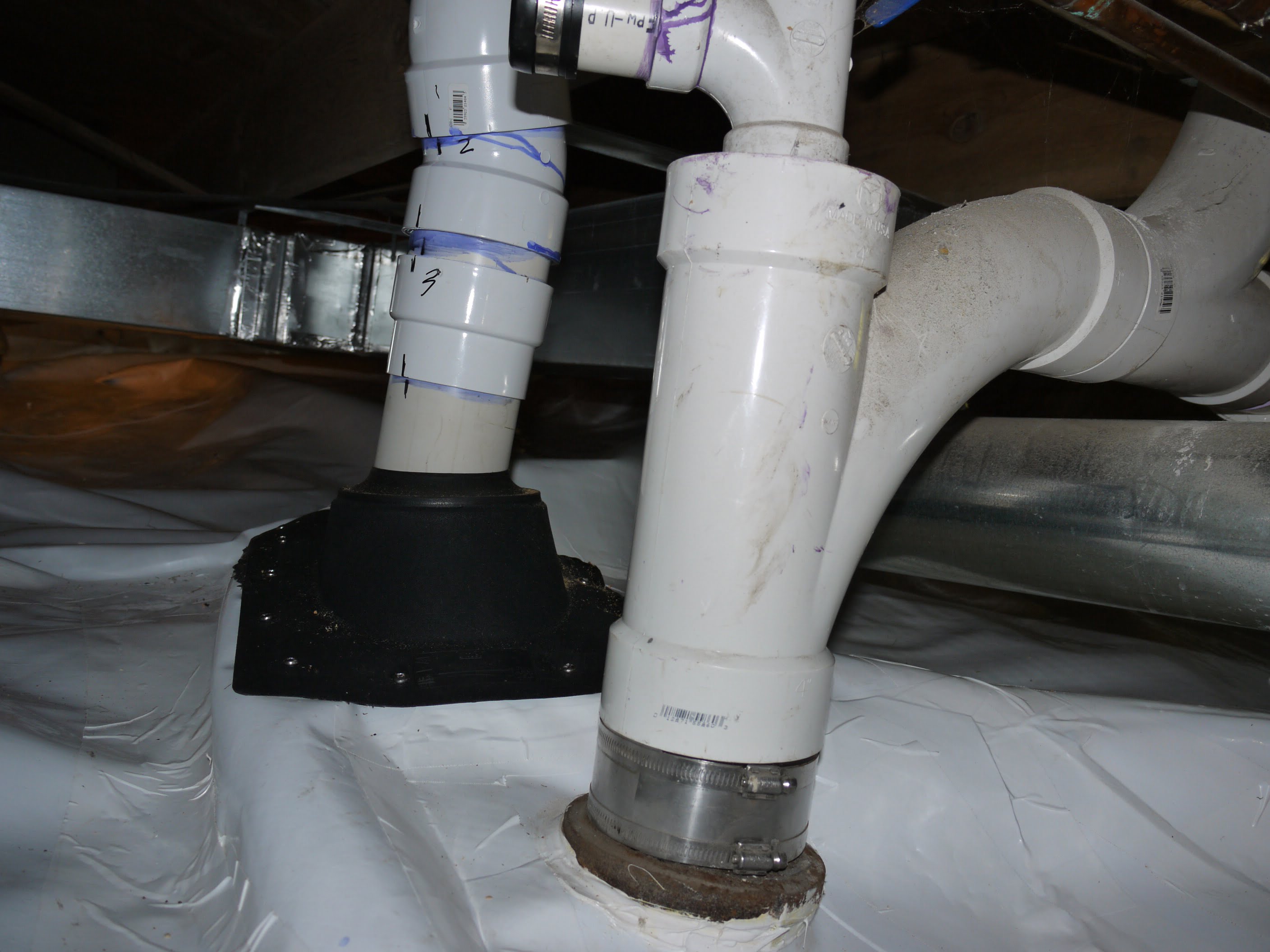 Penetrations through vapor barrier can be sealed with polyurethane caulk.
