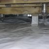 Encapsulation of crawl space with vapor barrier membrane - a step by step DIY guide.