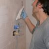 Apply grout using a soft rubber grout float.