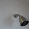 Installed shower arm and shower head.