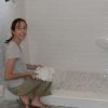 Check tile arrangement and stability by dry setting them on shower pain.