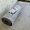 The SunTouch HeatMatrix uncoupling membrane for inlay radiant heat cable installed in our cabin sunroom.