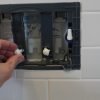 Wall hung toilet actuator frame and flush control push rods.