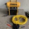 Sprinkler winterization supplies; air compressor, air hose, wrench, screwdriver and 1/4" pipe nipple.