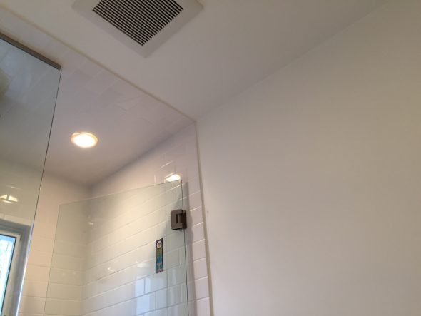 Finished bathroom ceiling and walls after using tile backer board and finished with paint.