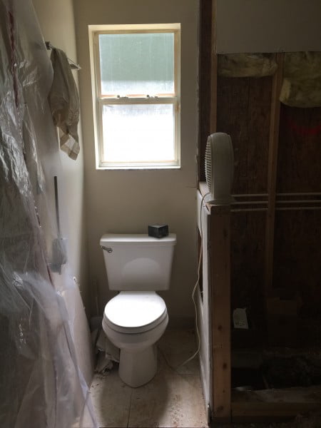 Can I mount a tankless toilet in an exterior bathroom wall?