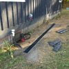 Channel drain system by NDS installed in yard as in-ground gutter system - grates installed