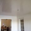 White beadboard ceiling in porch after finish painting.