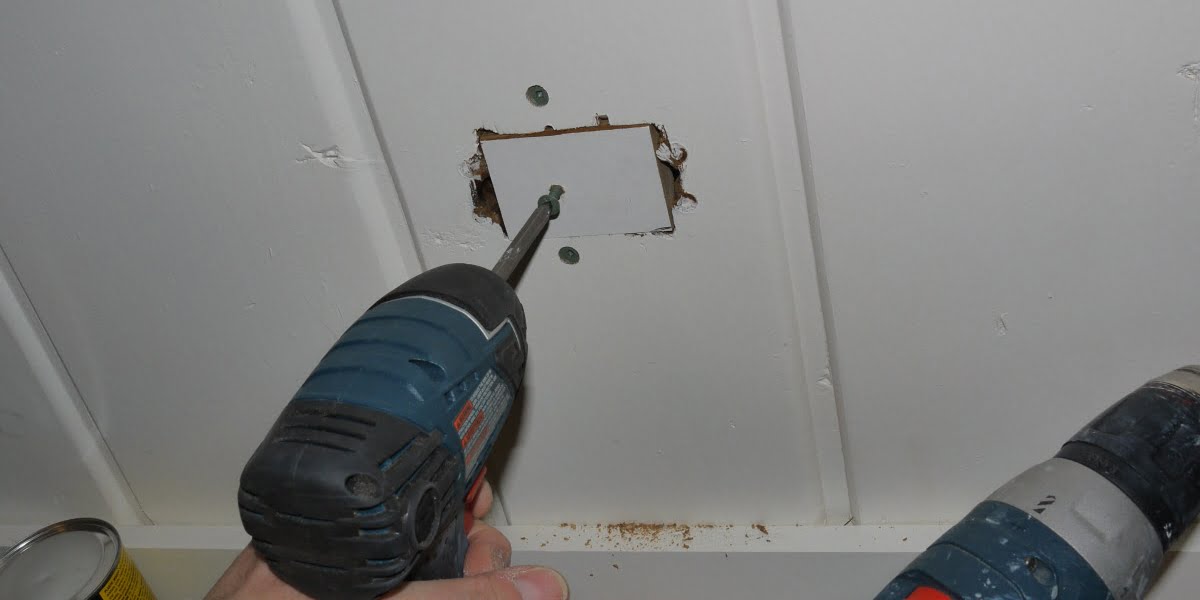 Fix a hole in the wall with a patch and filler DIY.