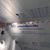 Foil-faced polyisocyanurate foam insulation installed in walls ceiling and floor of wine cellar.