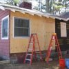 Plywood replaced old original Armstrong Temlok sheathing prior to board and batten siding install.