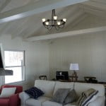 Painted interior wood paneling, ceiling and beams - after.