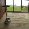 Remove carpet glue residue from concrete floor with Clarke FM Floor Maintainer with brush attachment.