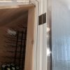 Smooth, finished foil tape edge of insulated cellar door.