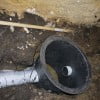 Sump basin and drain tile install in crawl space.
