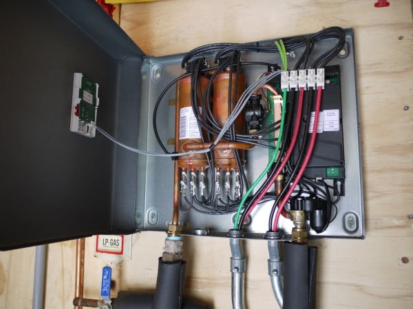 Stiebel Eltron Tempra 24 Plus electric tankless water heater connecting input and output plumbing.