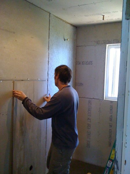 Rough in of tile backer board in bathroom - used for shower, walls and ceiling.