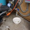 Whole house water filter element change - draining system before opening filter housing.